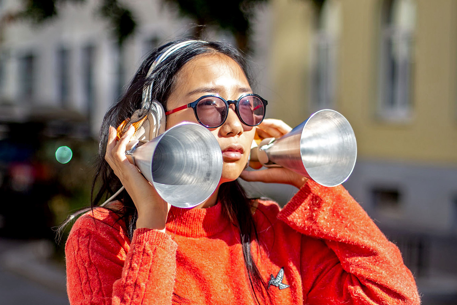 girl using funnel shaped headset