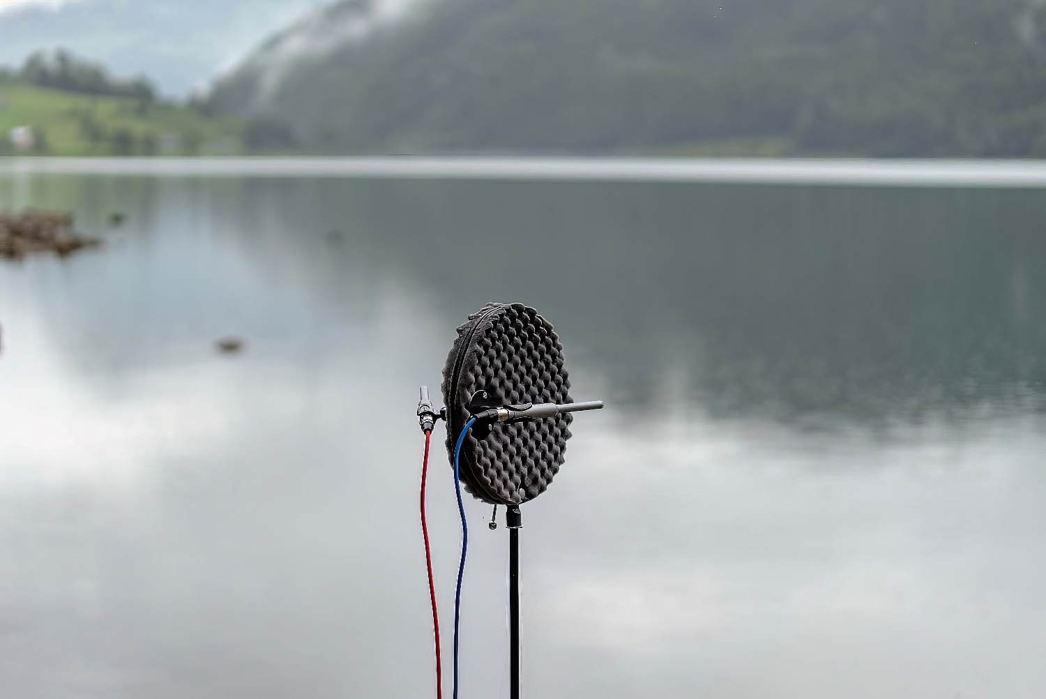 a stereo-microphone setup recording a lake
