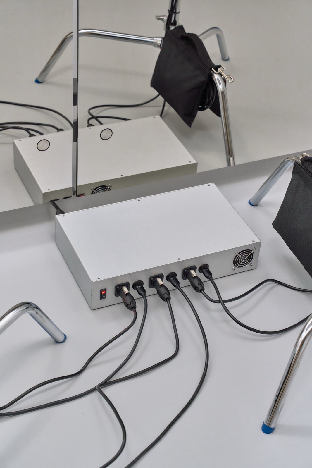 © Federico Floriani/MAK image of the media console, a uniform utilitarian-looking metal box with cables coming out